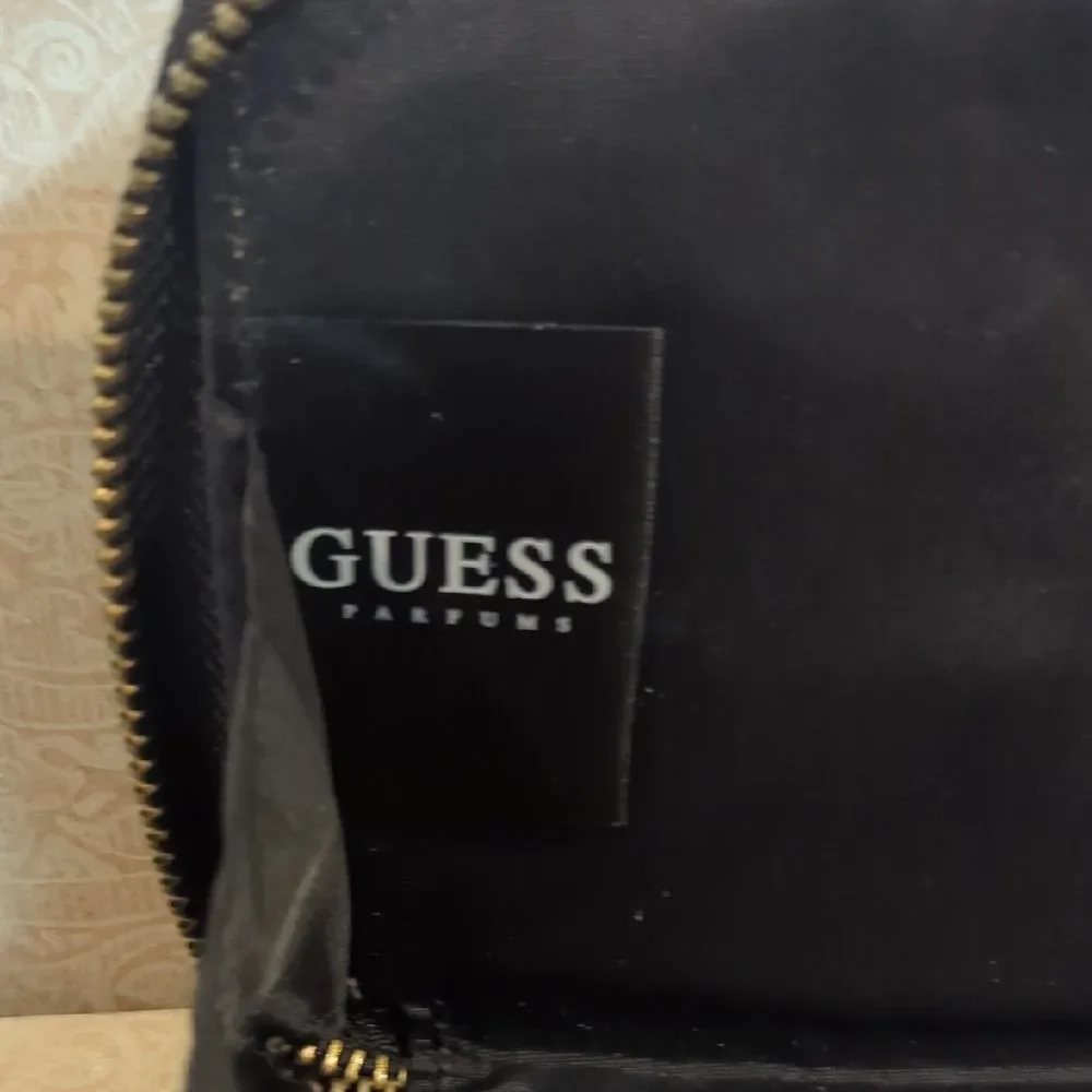 Guess Black and Gold Studded Women's Wristlet Wallet Handbag